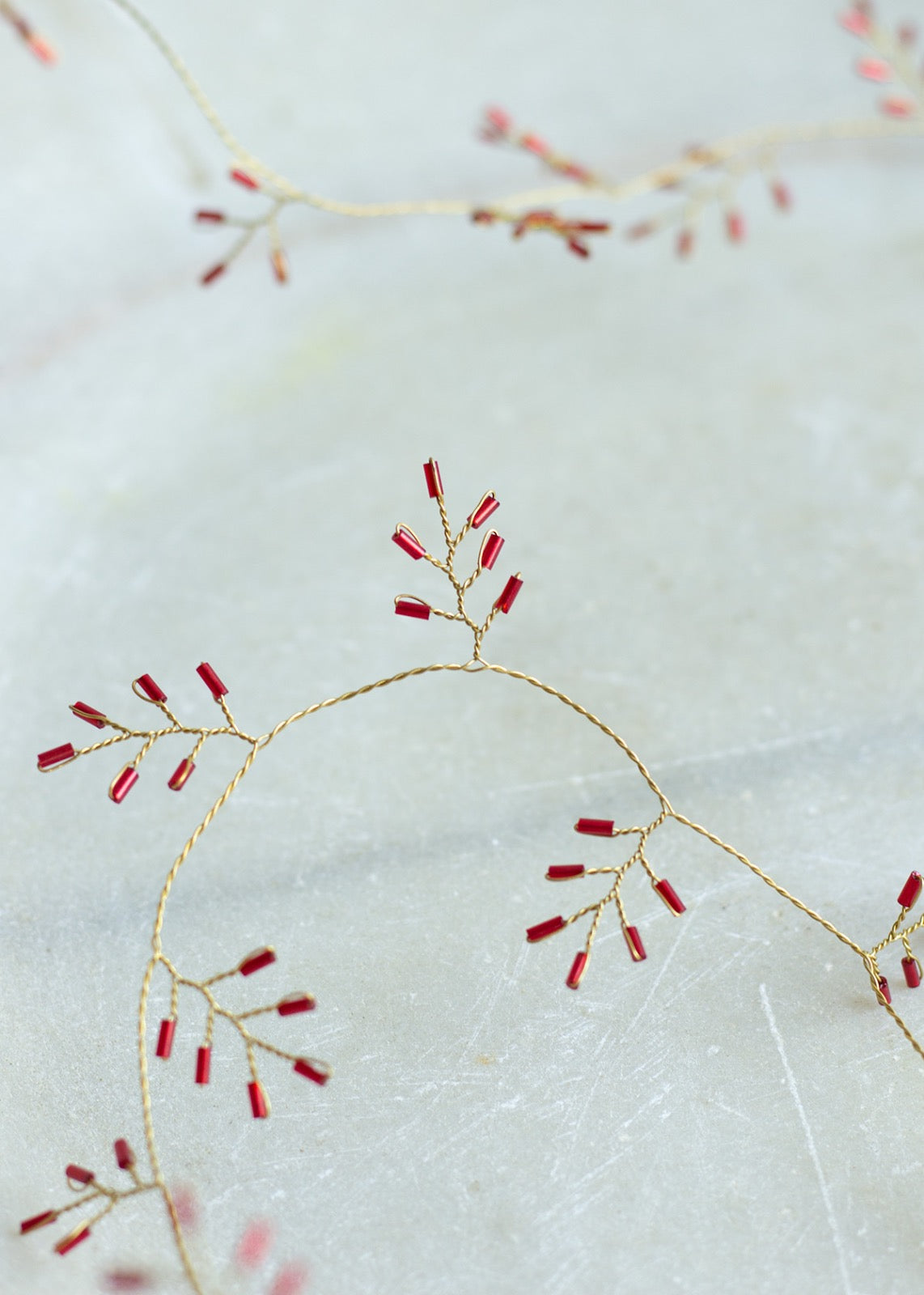 Guirlande de perles rouges WD41