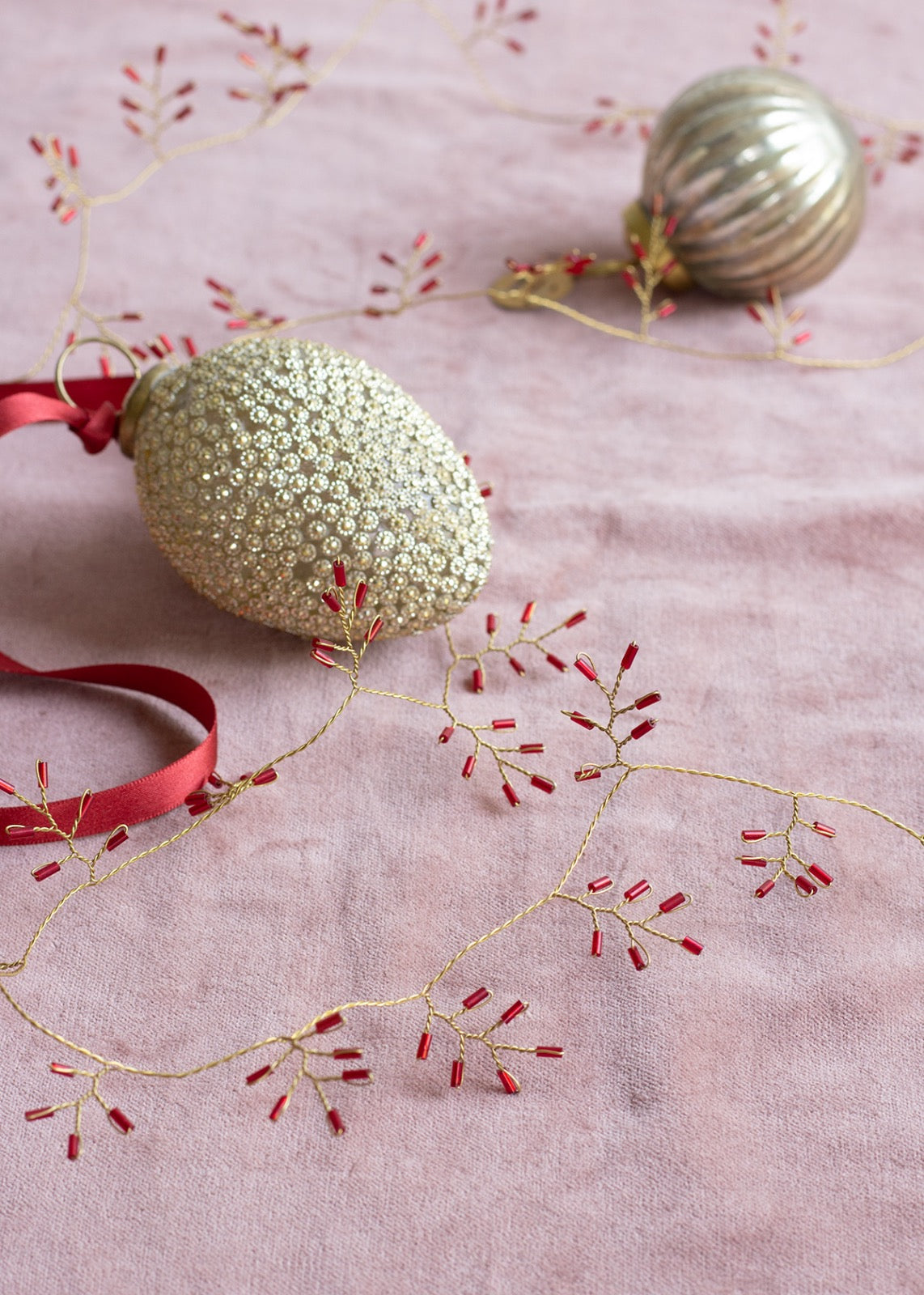 Guirlande de perles rouges WD41