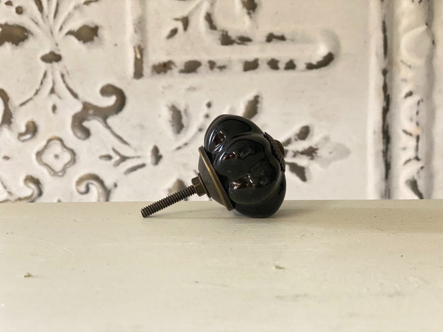 Bouton courbé noir MJ-399