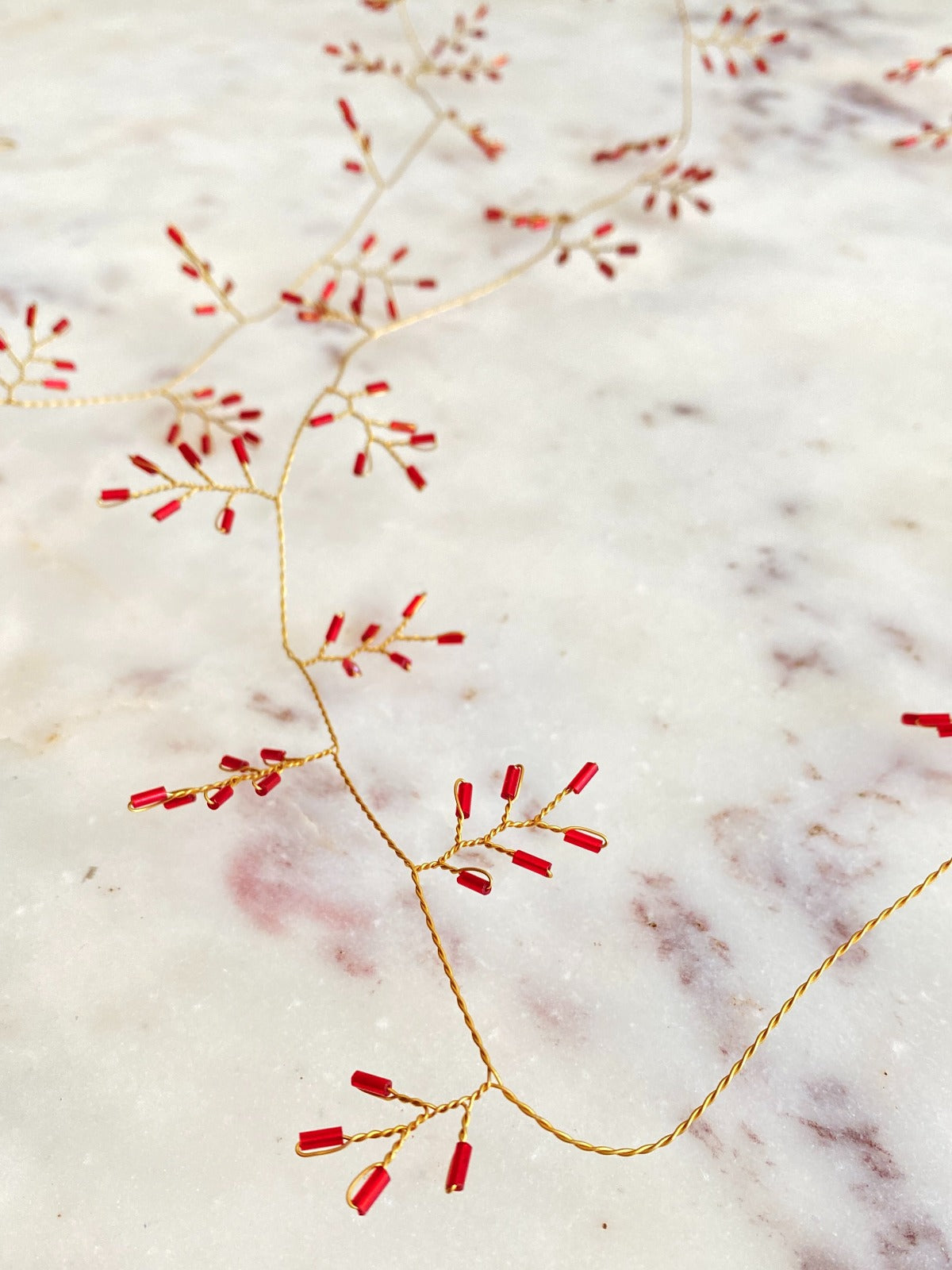 Guirlande de perles rouges WD41