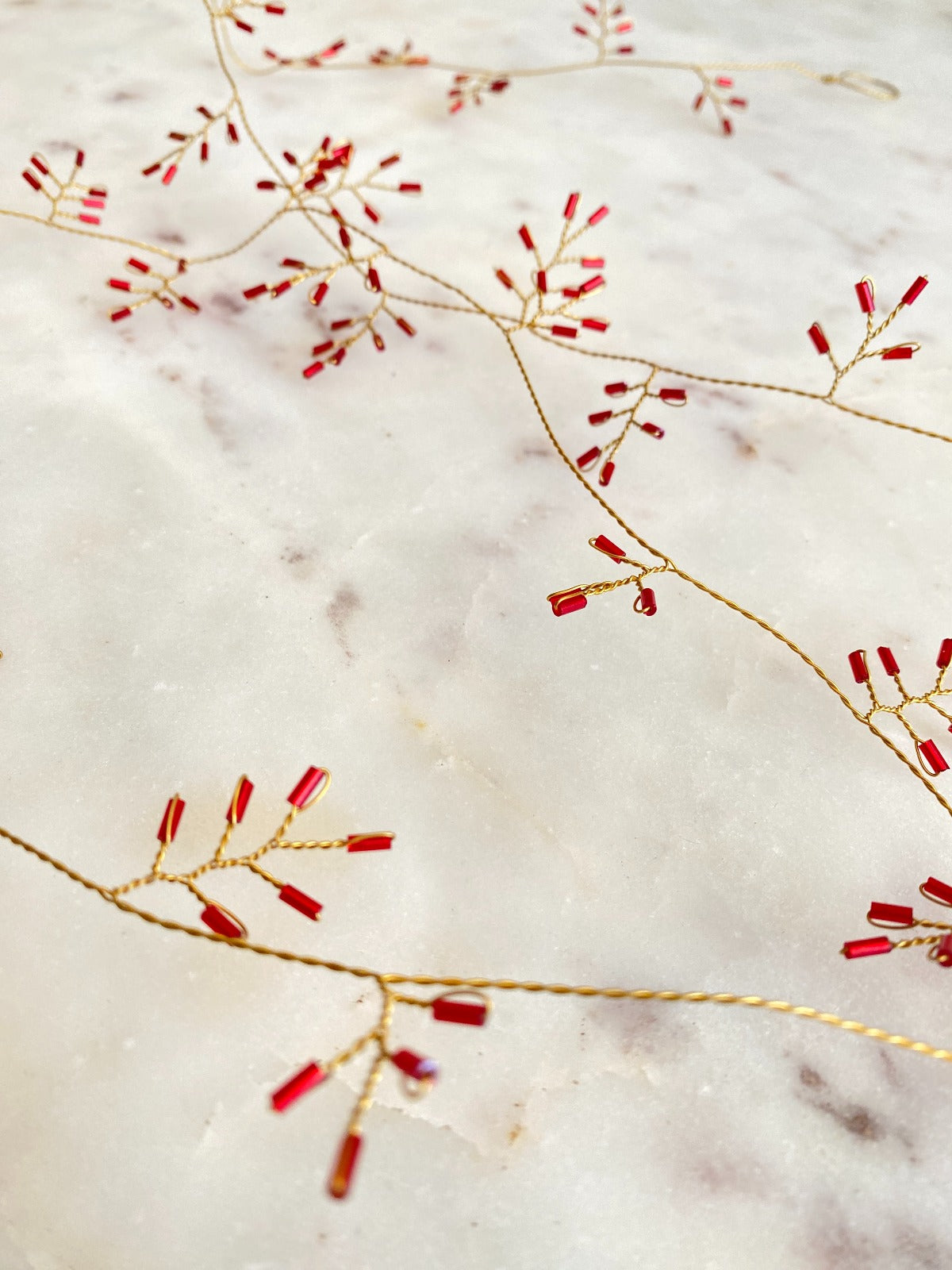 Guirlande de perles rouges WD41