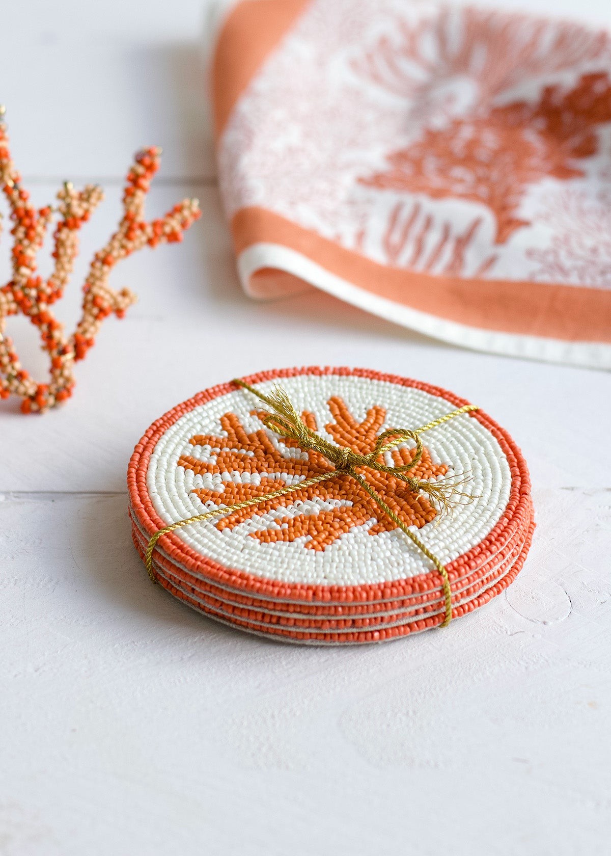 Coral beaded coaster s/4 AKS013