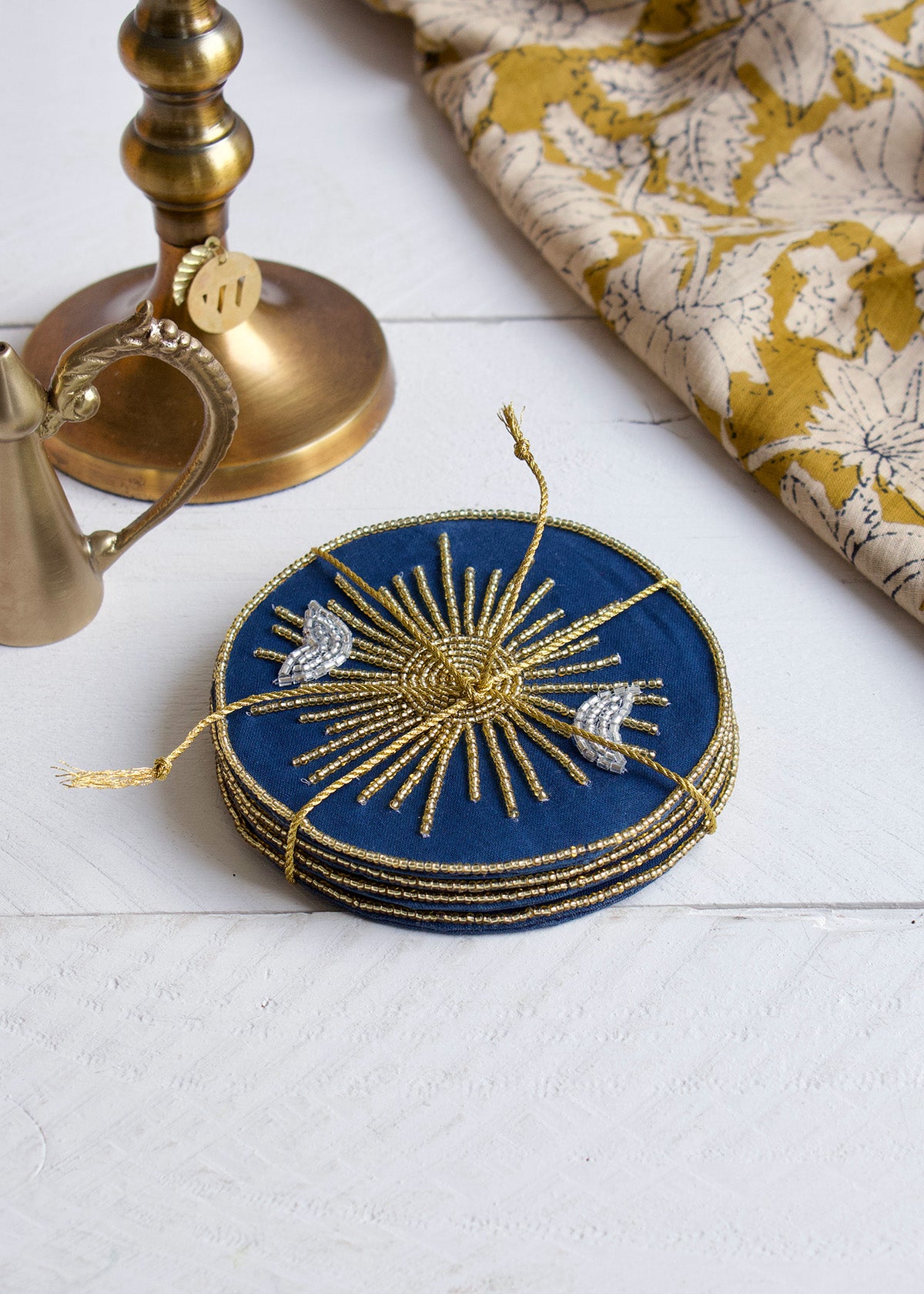 Sun beaded coaster s/4 AKS005